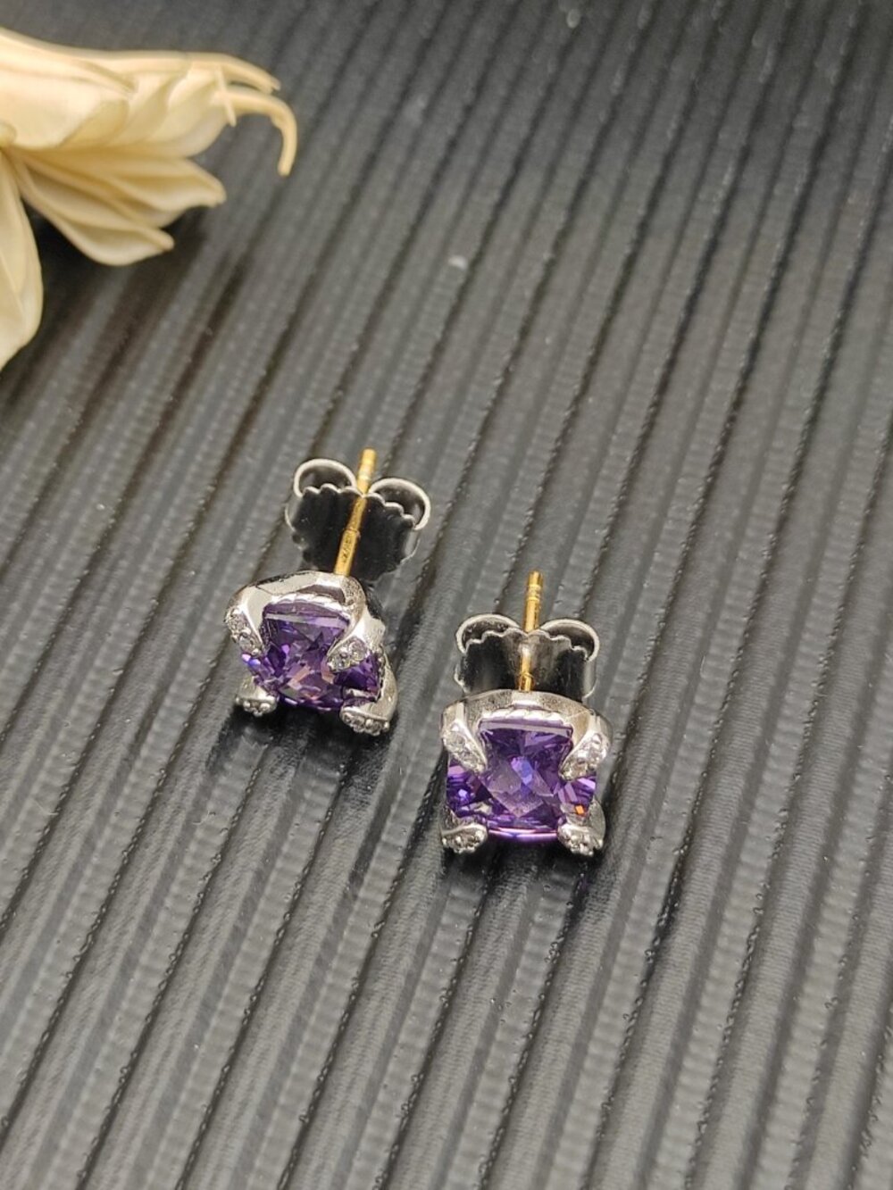 David Yurman four-prong earrings with a main stone and purple diamond. - Picture 2 of 4